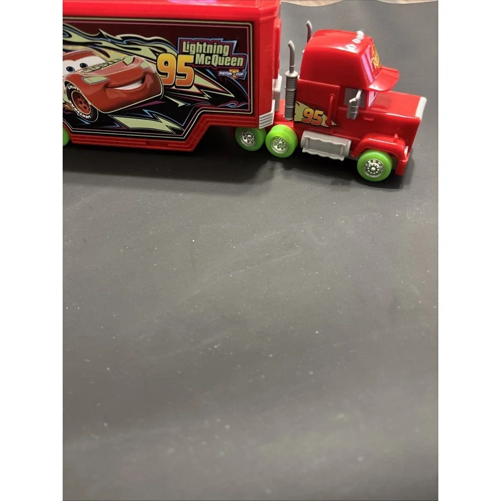 Disney Pixar Cars Lot - Mack Transforming Playset Hauler & Moving Moments Mater